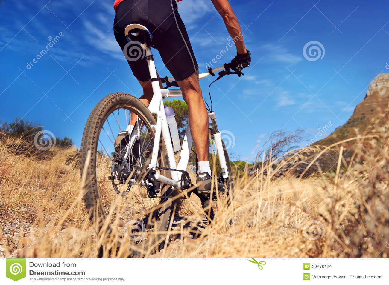 Mountain Bike Man With Blue Sky Riding On Outdoor Trail In Nature 