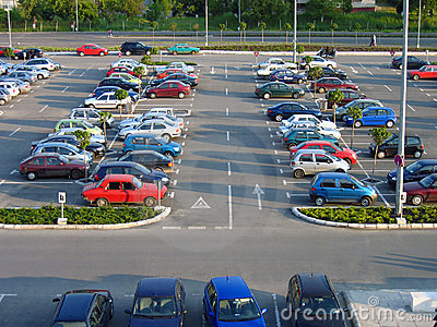 Parking Lot Of A Shopping Mall At Late Afternoon  No Visible Trademark