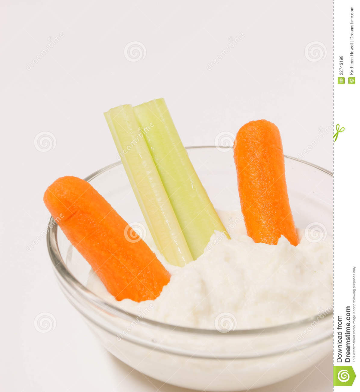 Small Clear Bowl Of Dip And Vegetables  Royalty Free Stock Photos
