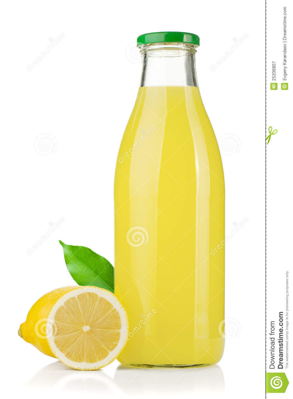 Bottle Of Lemon Juice And Fresh Lemons Royalty Free Stock Photography    