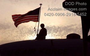 Free Public Domain Picture  American Soldier Holds The Flag On Top Of
