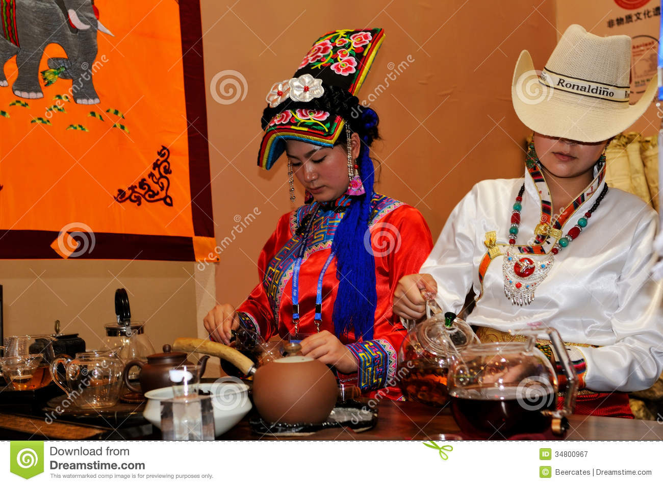 Minority Girls Serving Tea2013 Wcif Editorial Photography   Image    