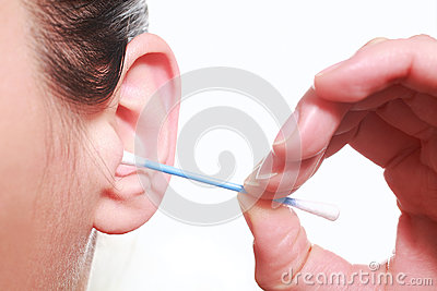 Photography Closeup Of A Woman Cleaning The Ears With A Cotton Stalk