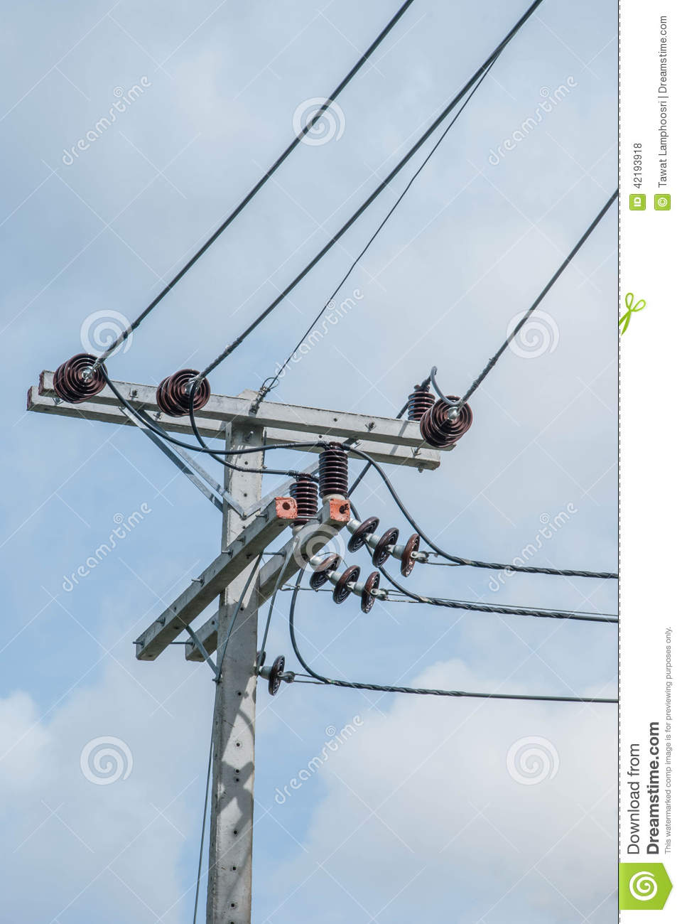 Transformer And Power Lines On A Cement Post 