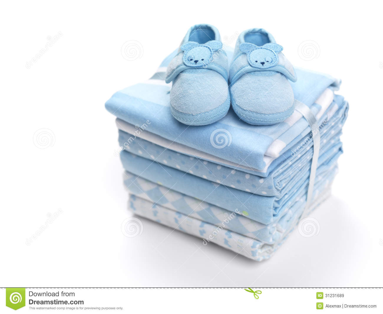 Cute Blue Baby Boy Shoes On A Pile Of Swaddling Blankets Isolated On