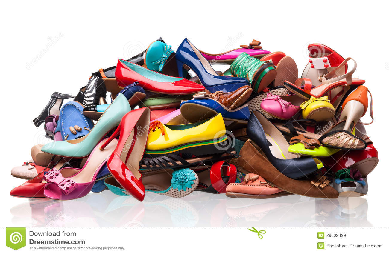 Pile Of Various Female Shoes Over White Royalty Free Stock Images