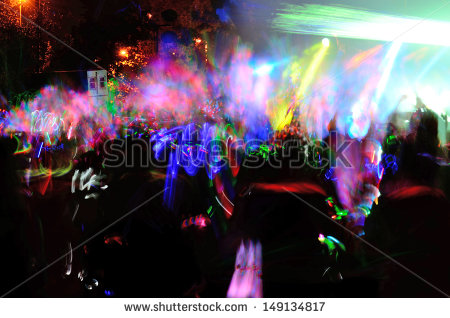 Color Neon Streaks Of Light Glow Sticks At A Night Celebration And