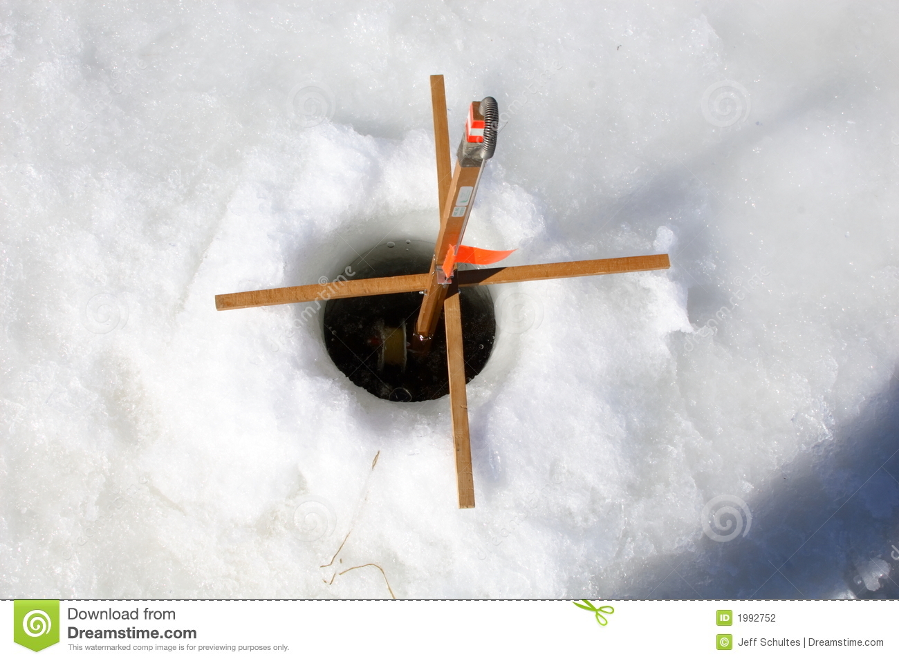 Ice Fishing Rod In A Hole In The Ice