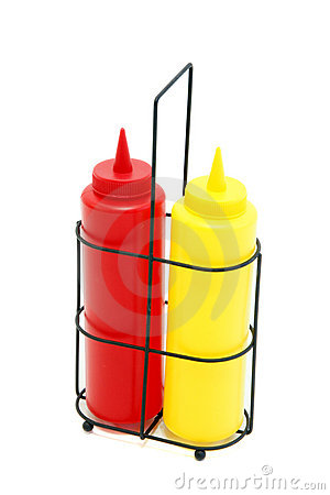 Pair Of Restaurant Style Mustard And Ketchup Bottles In The Rack