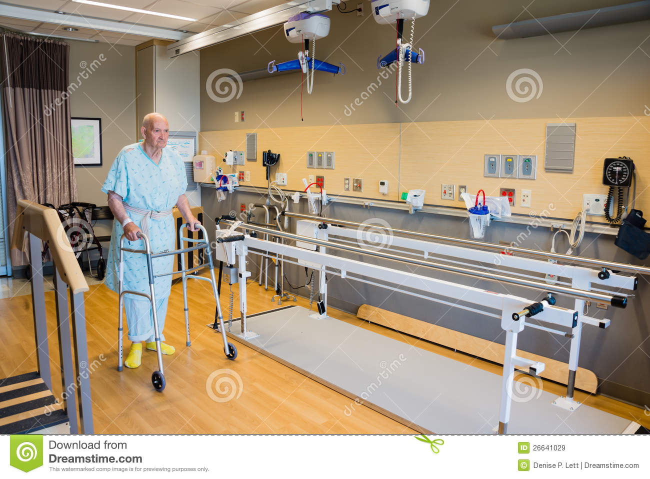 Walker In A Hospital Physical Therapy Facility Between A Staircase And