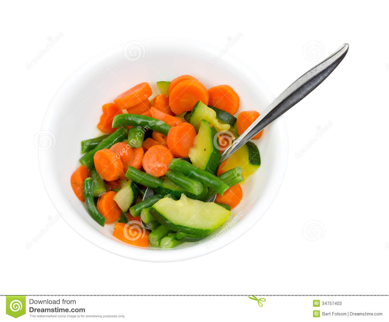 White Bowl Filled With Cooked Zucchini Green Beans And Carrots In A    