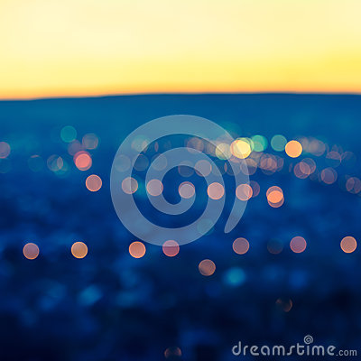 City Blurring Lights Abstract Circular Bokeh Blue Background With