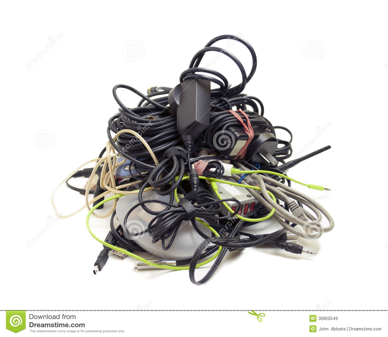 Messy Pile Of Computer And Electronics Cables Isolated On A White