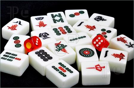 Chinese Mahjong Tiles And Dices On A Black Background