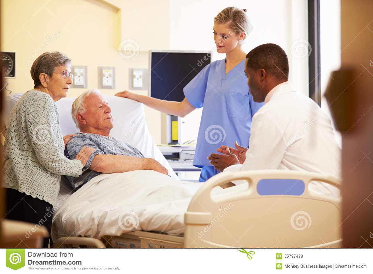 Stock Photos  Medical Team Meeting With Senior Couple In Hospital Room