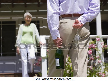 Picture Of Senior Woman Descending Veranda Steps Focus On Senior Man    