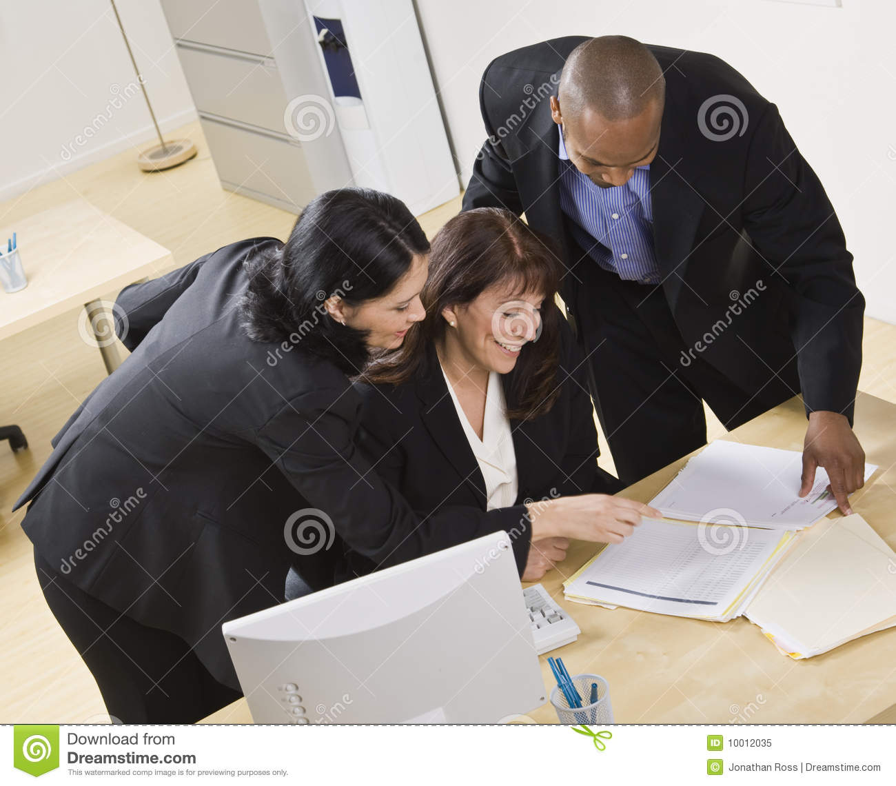 Group Of Business People Are Working Together In An Office  They Are