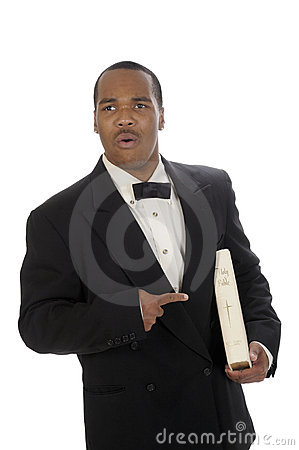 Young African American Preacher Giving Sermon Pointing At The Bible 