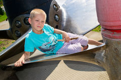 Boy On The Ship S Propeller Royalty Free Stock Photo