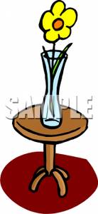 Clipart Image Of A Yellow Flower In A Clear Vase On A Side Table