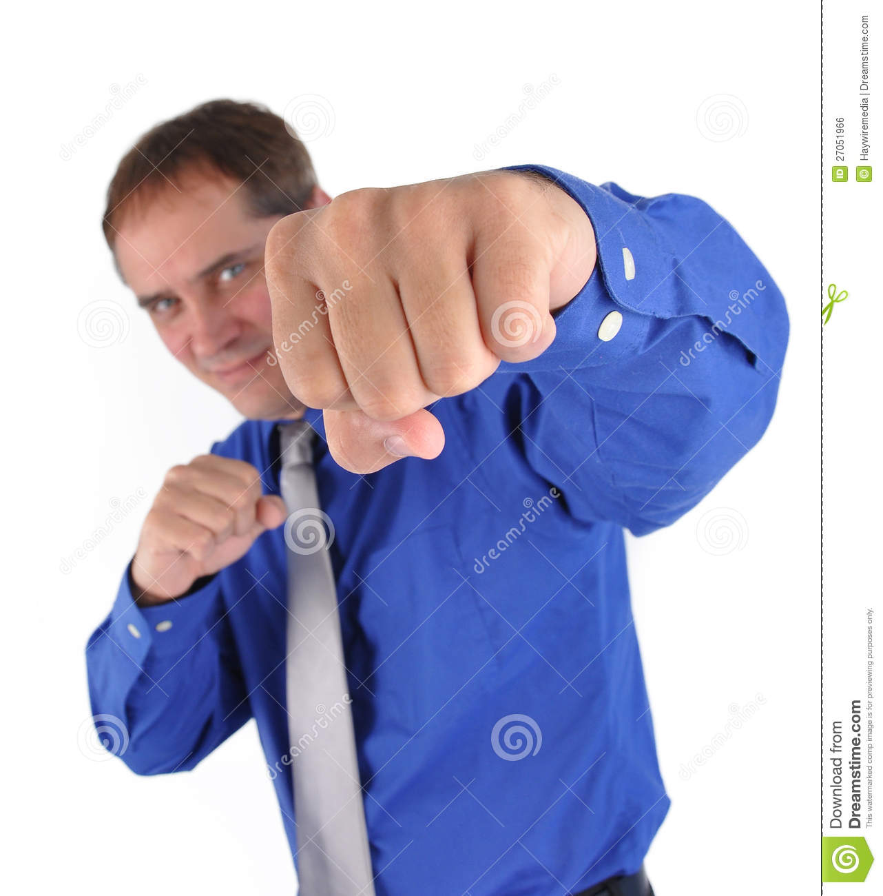 Strong Business Man Has His Fist In The Air And Punching The Camera