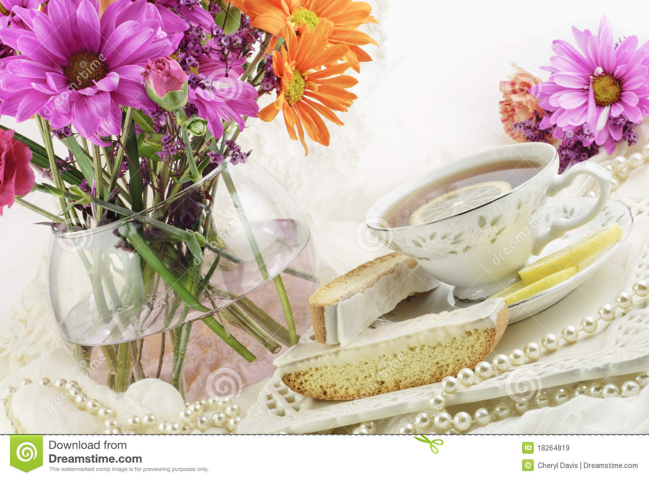Beautiful Bright Ladies Tea Party With Cup Of Tea Lemon Biscotti