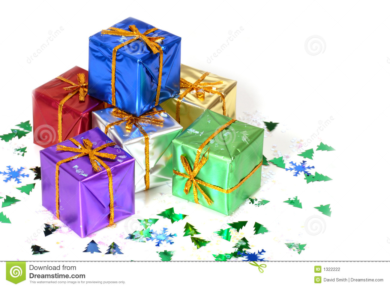 Six Brightly Colored Wrapped Christmas Presents With Holiday Confetti