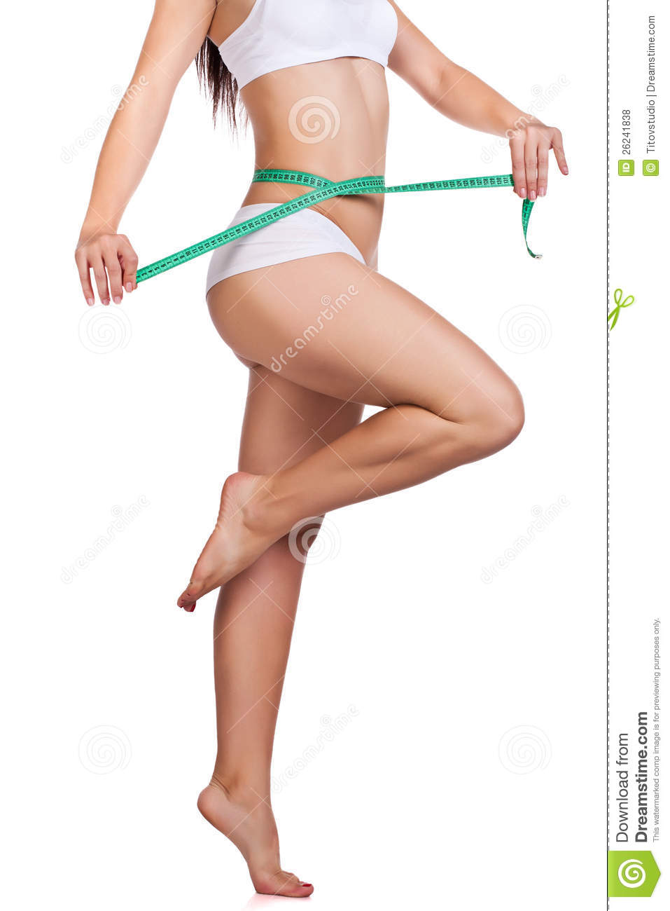 Sporty Woman S Body And Measuring Tape Royalty Free Stock Photos