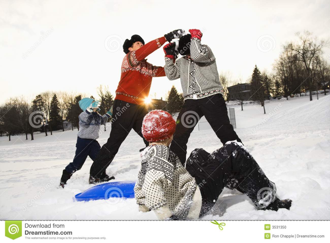 Family Playing In Snow  Stock Photo   Image  3531350
