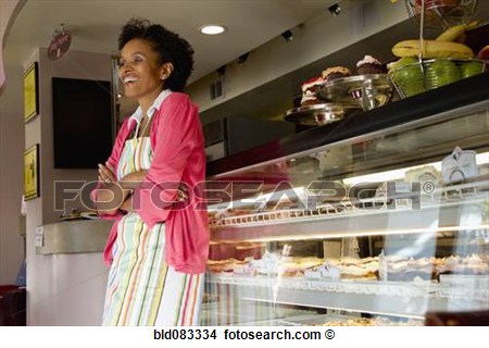 African American Bakery Owner Standing In Shop View Large Photo Image