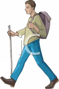 Man Walking With A Walking Stick And Carrying A Backpack Royalty    