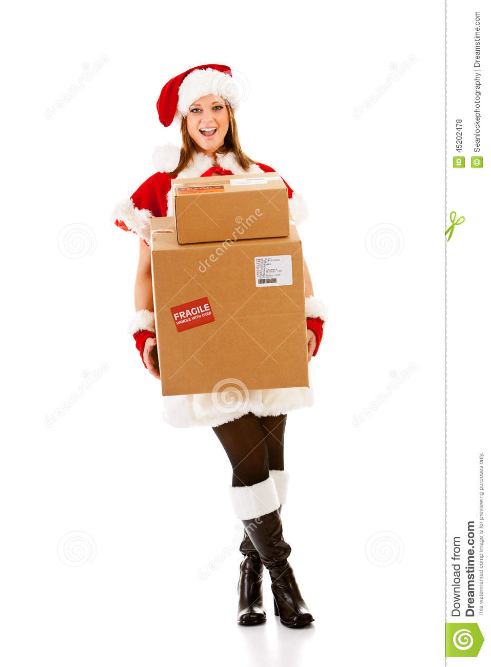 Caucasian Female Dressed In A Cute Santa Elf Outfit  Note Fake