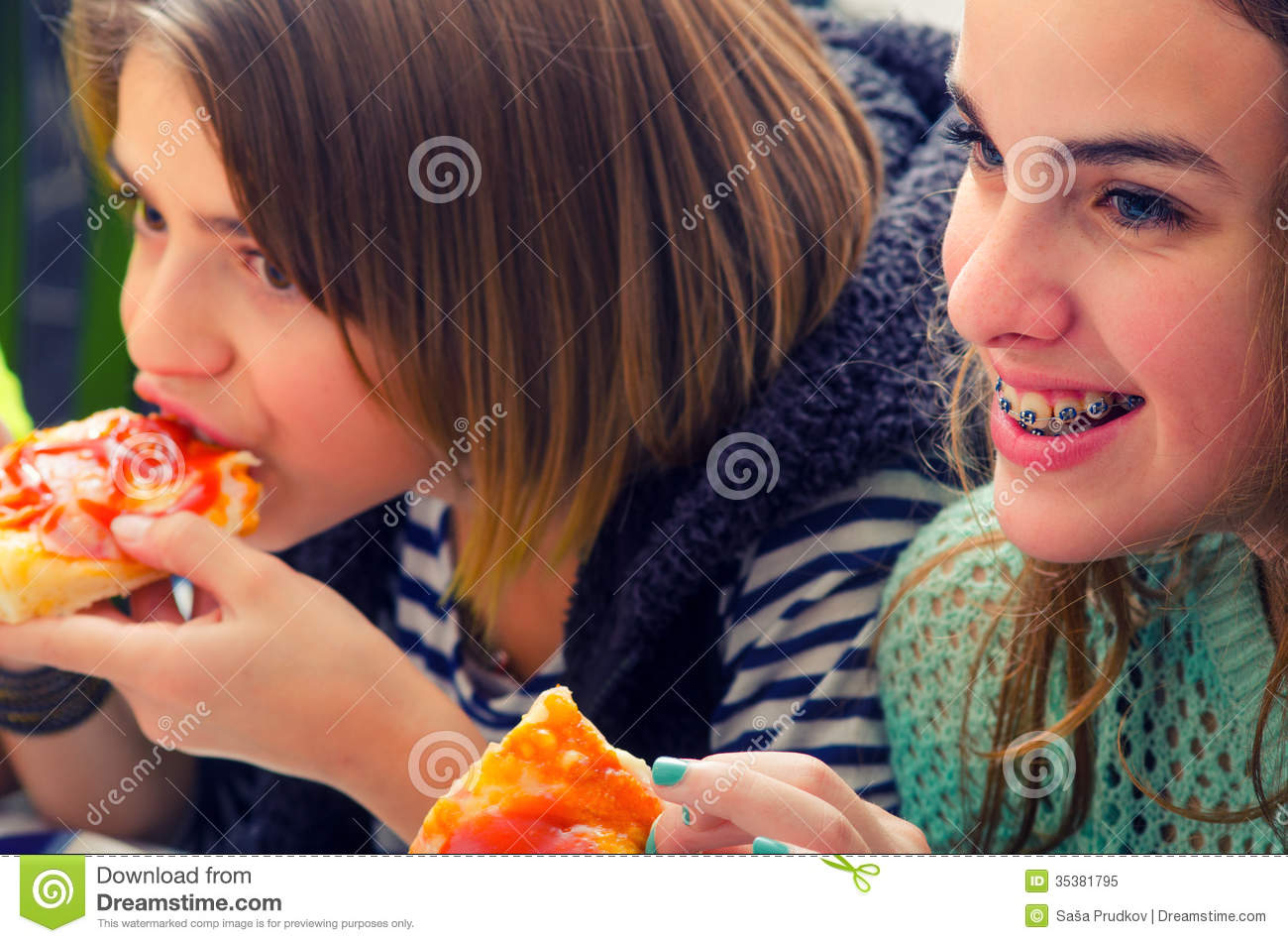 Teenage Girls Eating Pizza Royalty Free Stock Photo   Image  35381795