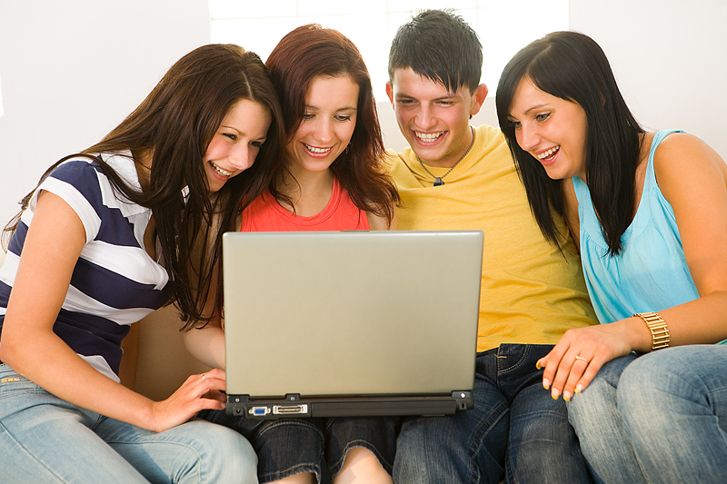 Young Adults At Computer Clipart  235 Kb