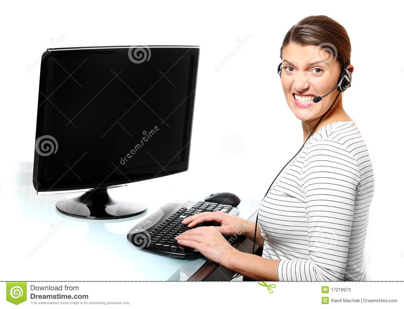 Portrait Of An Angry Woman Working On The Computer In The Office 