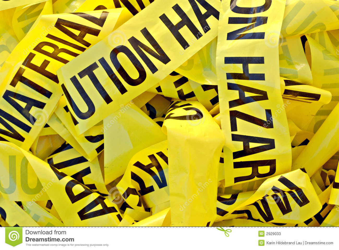 Pile Of Yellow Plastic Tape Marked Cautious Hazardous Material