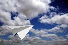 Paper Plane Flying In Blue Skies Royalty Free Stock Images
