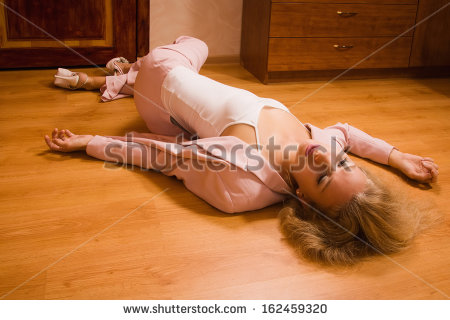 Unconscious Business Woman Lying On The Floor   Stock Photo