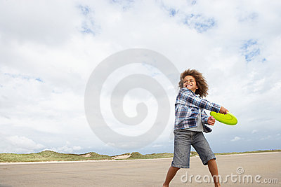 Boy Playing Frisbee On Beach Stock Photos   Image  19683583