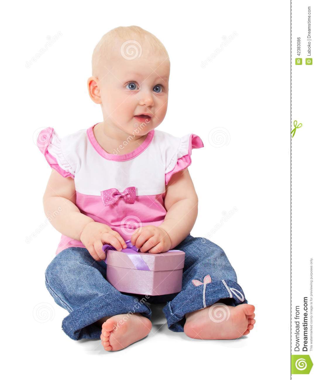 Little Girl In Jacket And Blue Jeans With Gift Box Stock Photo   Image