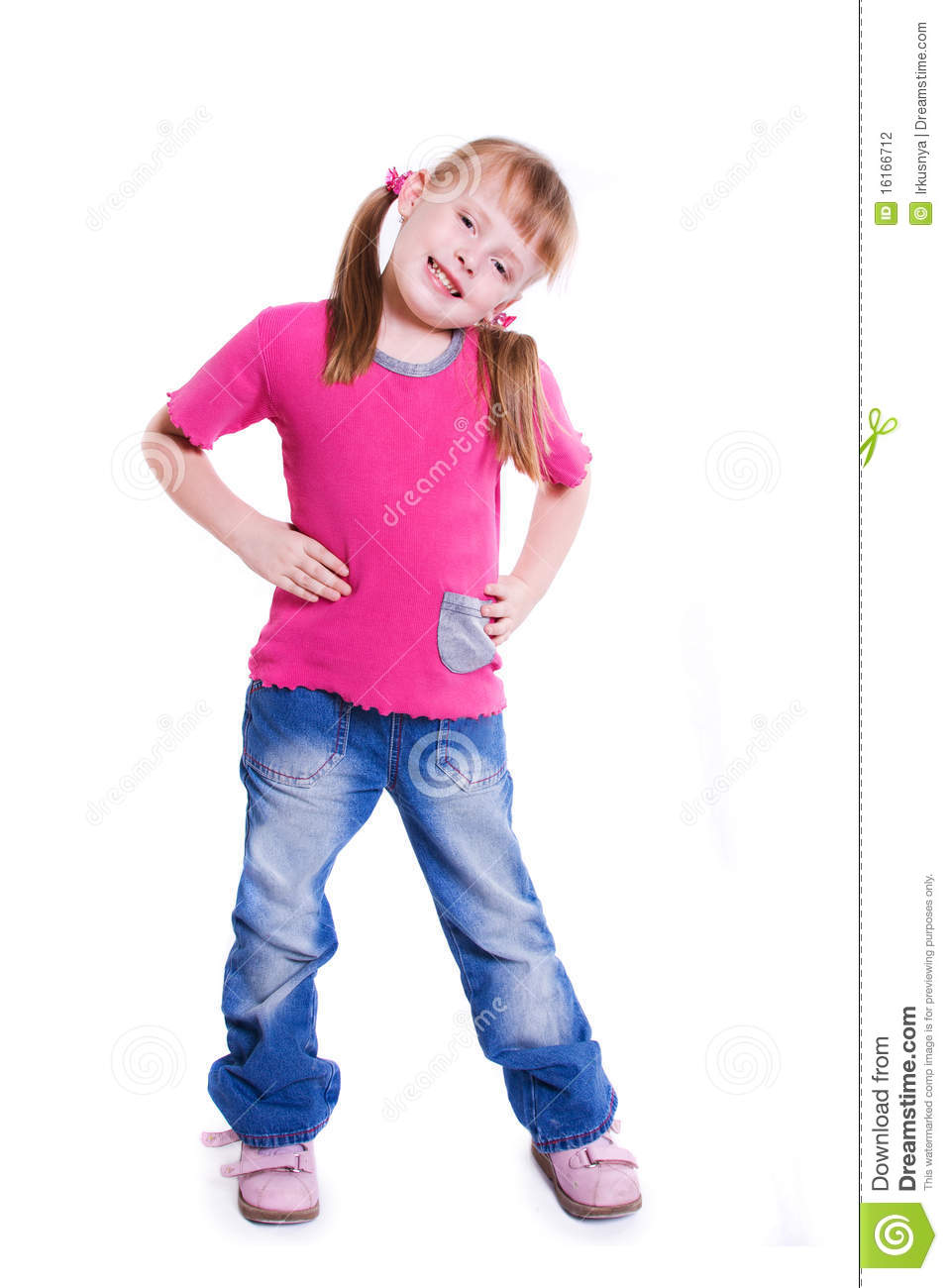 Little Girl Posing On Front Of Camera  Little Girl In Jeans On White