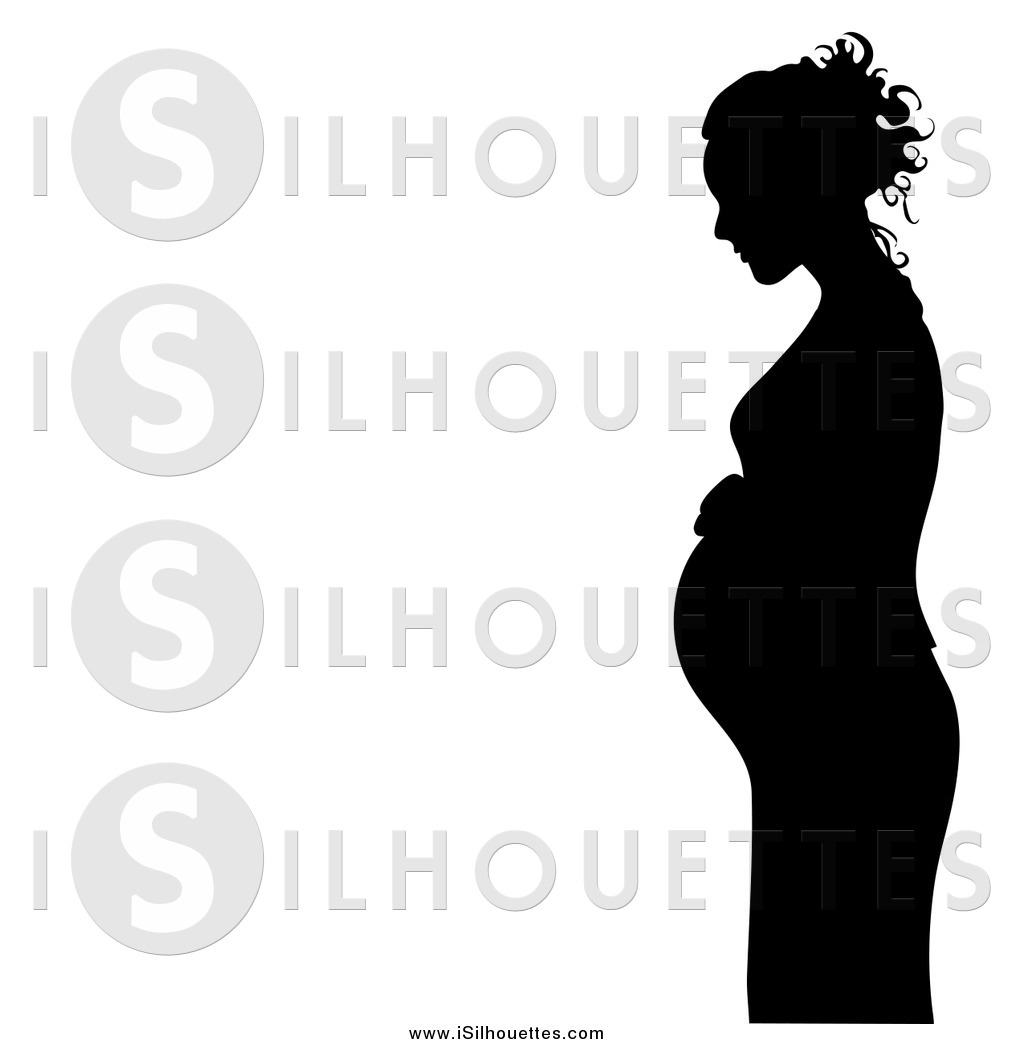Silhouetted Pregnant Woman In Profile Touching Her Baby Bump Pregnant