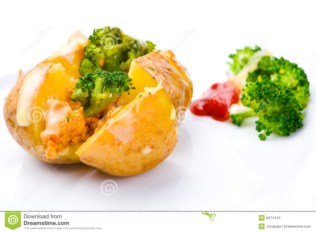 Baked Potato With Chicken And Broccoli Inside It And Covered With    