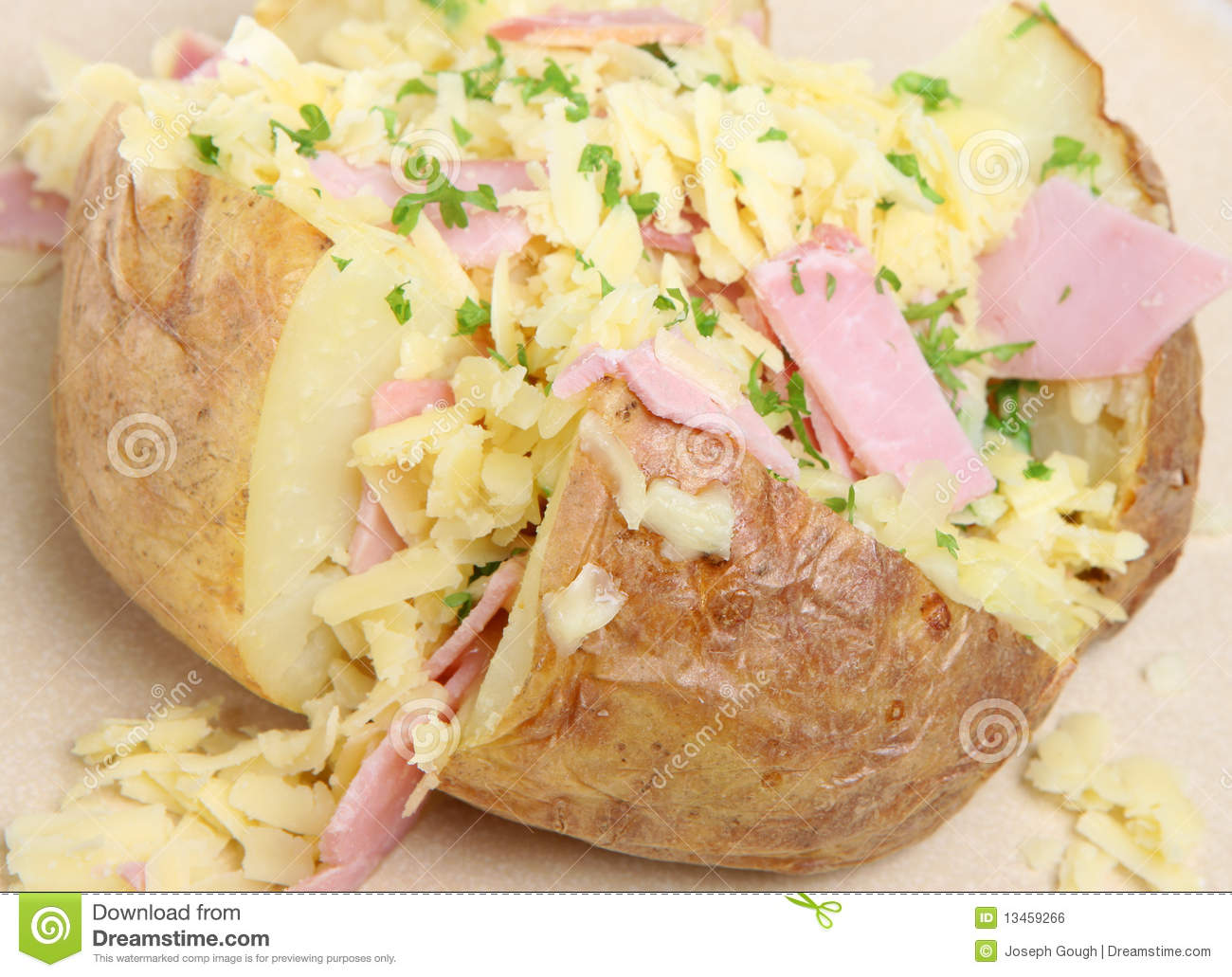 Baked Potato With Grated Cheddar Cheese And Ham