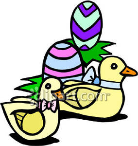     Ducks And Brightly Colored Easter Eggs   Royalty Free Clipart Picture