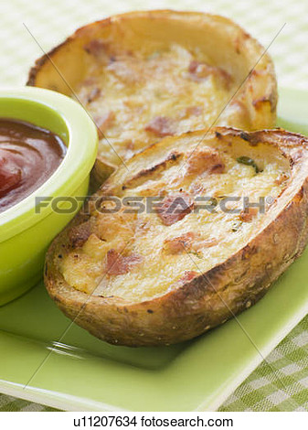Stock Photo   Ham And Cheddar Cheese Stuffed Potato Skins  Fotosearch
