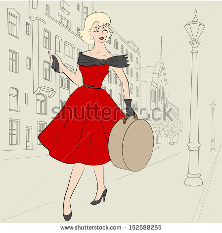 Elegant Woman Of 50s With Hatbag On European City Street   Stock