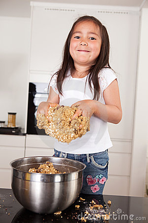 More Similar Stock Images Of   Little Girl Making Cookies