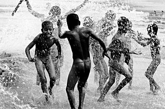 Child Playing Black And White Children Playing In Water