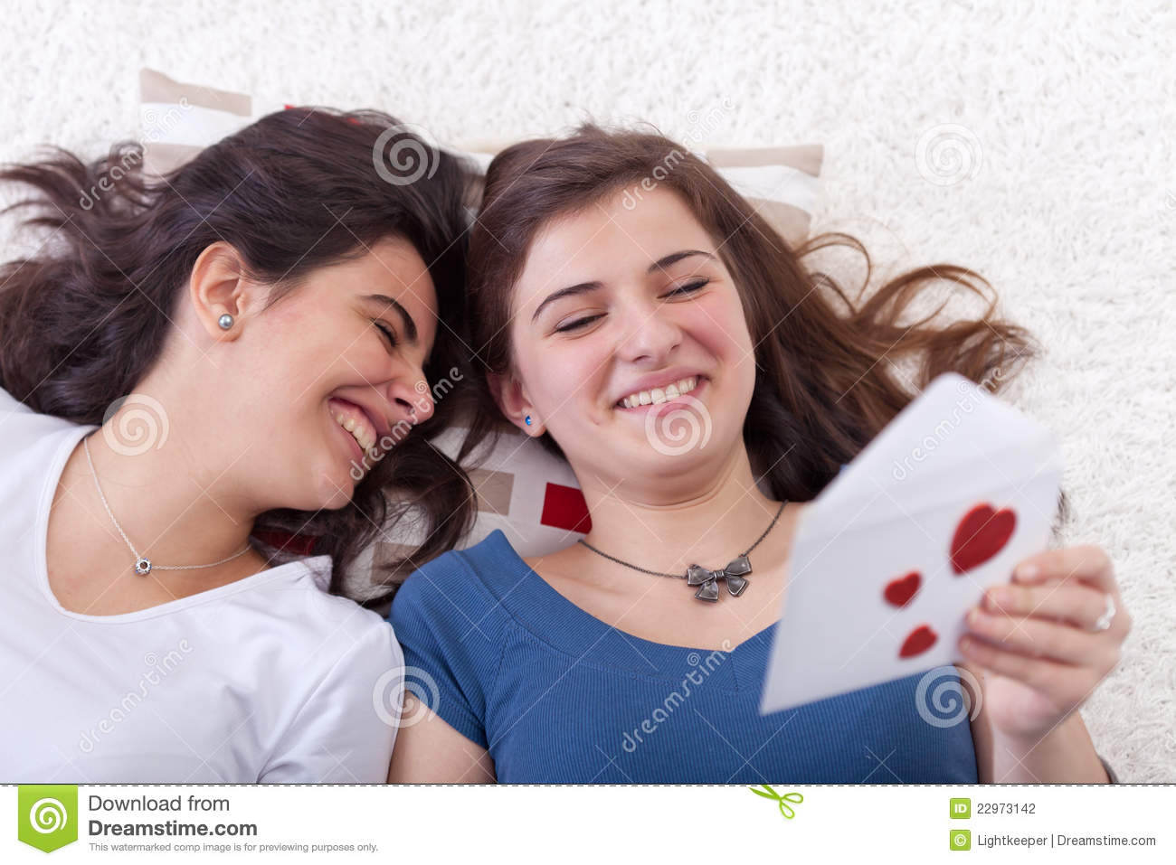 Young Teenagers Reading Love Letter And Having Fun On Valentine  S Day